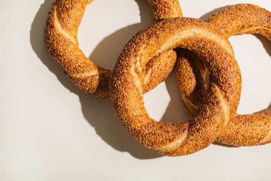 Turkish simit (bagel) closeup on beige background