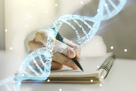 Creative concept with DNA symbol illustration and man hand writing in notebook on background. Genome research concept. Multiexposure