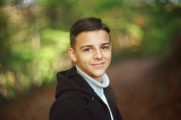 portrait of handsome young man outdoors