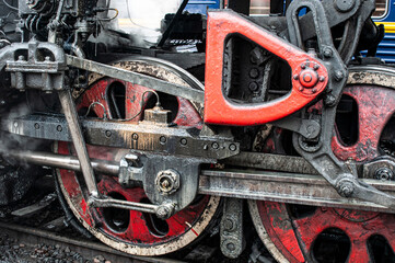 Wheels of a old antique steam train close up