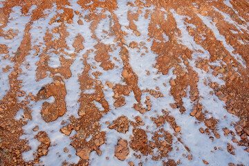 Streaks of Snow On Top of Orange Hoodoo Erosion