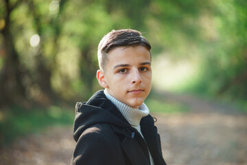 portrait of handsome young man outdoors