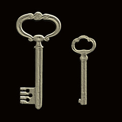 Two old embossed brass keys