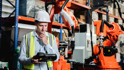 Industrial engineers are in charge of controlling the automated arms machine welding robots in companies that manufacture industrial goods.