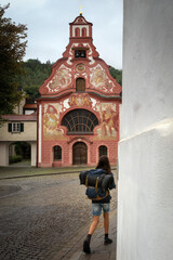 View of the traditional painted bavarian church of the holy spirit in the village of Fussen, famous travel destination on the Romanic Road of Bavaria, Germany