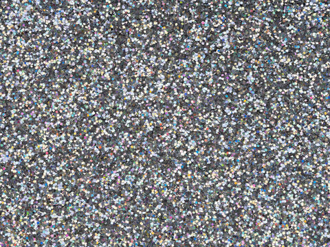 Holographic bright light grey glitter texture. Background or pattern of sparkling shiny glitter for decoration and design of unusual Christmas, New Year, xmas gift card or other holiday pictures.