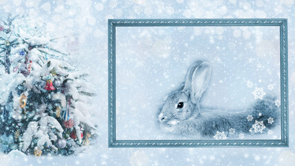 A rabbit outside the frame next to a snow-covered Christmas tree. Chinese New Year. The year of the rabbit. Copy space