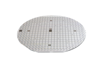 Semiconductor chip of a microcircuit of a powerful Darlington transistor on a semiconductor silicon multilayer wafer isolated on a white transparent background.