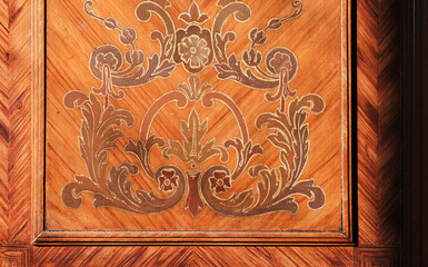 Decorative inlay carving pattern of vintage wooden wall panel