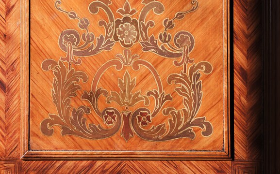 Decorative inlay carving pattern of vintage wooden wall panel