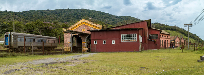 Old trains, locomotive and shed on railroad in Paranapiacaba, Sao Paulo, Brazil