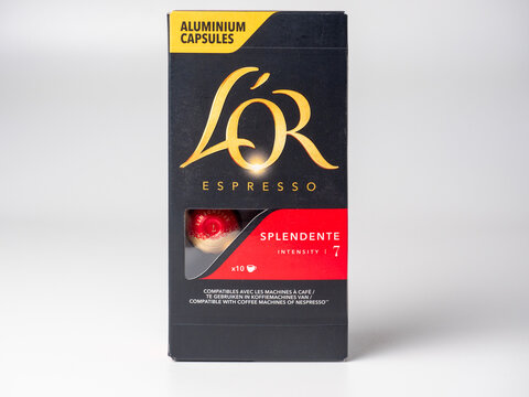 20.10.2021 , Moscow, Russia. Close-up of capsules with ground coffee L'OR Espresso Splendente. Capsules for Nespresso machines. A delicious and invigorating drink. Coffee from France. Side view