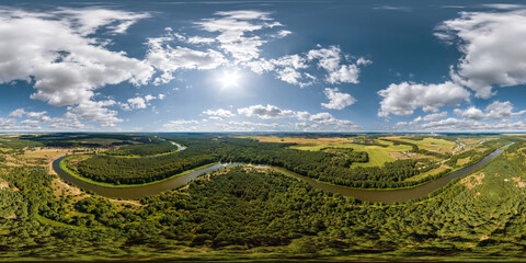 aerial full seamless spherical hdri 360 panorama view over meandering river and forest in sunny...