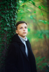 portrait of handsome young man outdoors