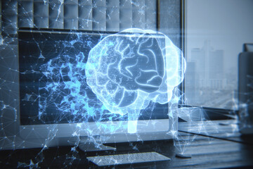 Close up of workplace with computer and abstract glowing polygonal human brain hologram on blurry background. Digital intelligence, ai and future concept. Double exposure.