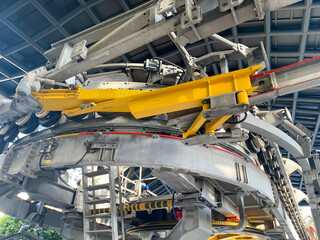 Metal industrial equipment, conveyor with chains and gears for moving cargo