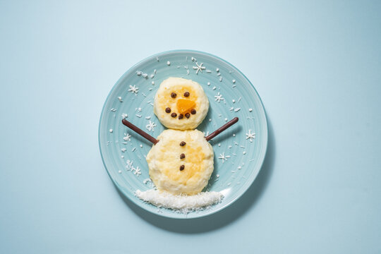 Funny snowman Christmas morning breakfast pancakes for kids
