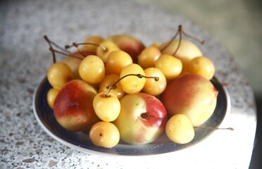 Naklejka na ściany i meble bowl of fresh white cherries berry and fruits
