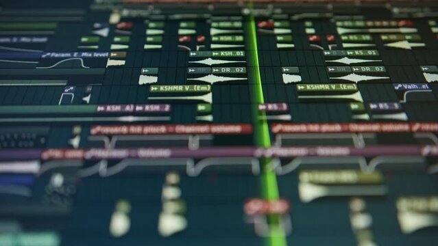 sequencer with a huge musical project - the playhead moves along the music track. Creating music on a computer, screen