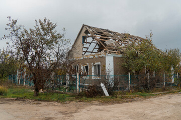 Countryside. House destroyed by shelling. War in Ukraine. Russian invasion of Ukraine. Destruction...