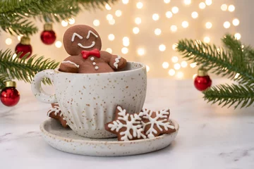 Poster Gingerbread cookie man in a cup of hot chocolate or cappuccino © azurita
