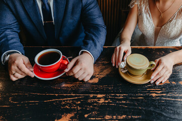 Couple drinking coffee at cafe restaurant man and woman