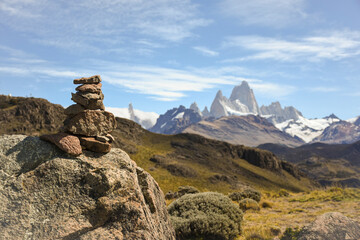 Stacked stones (apachetas). and in the background the Cerro fitz roy in the background. the chalten. Argentine Patagonia.