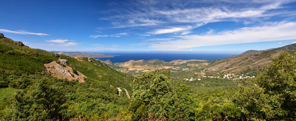 Naklejka na ściany i meble Panorama from Col de Teghime, green hills and Mediterranean sea in the background, Landscape od Cap Corse in Corsica