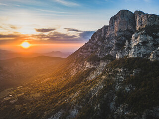 Autumn landscape at Les Trois Becs in Provence Drôme. Panoramic landscape of the valley during sunset. Limestone rocks covered with trees in autumn colors