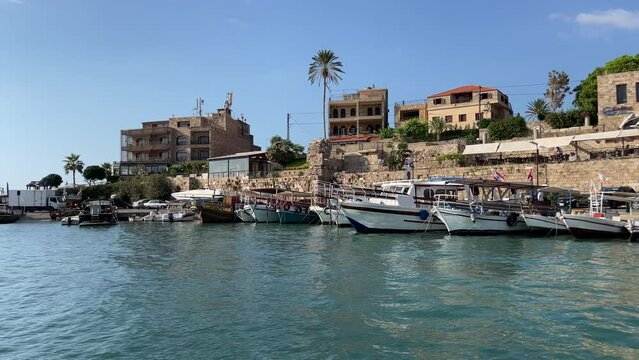 Famous and Historic Mediterranean Coastal Town Byblos, Lebanon - Tourist attractions with restaurants and boats in Lebanon - view from the ocean