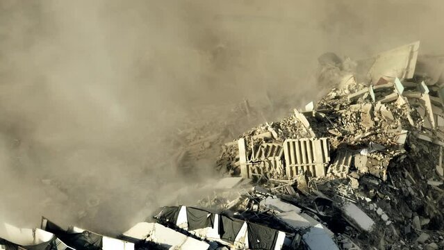 Smoke from collapse rubble building aftermath