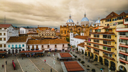 aerial view of Cuenca old capital of Ecuador during epic sunset with new cathedral and buildings...