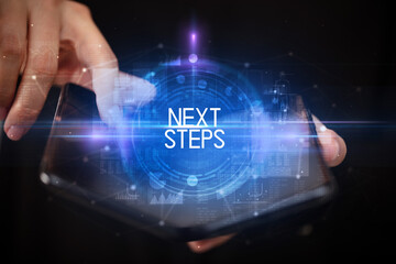 Young man holding a foldable smartphone