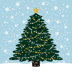 舞い散る雪の中のクリスマスツリー