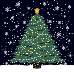 雪降る夜のクリスマスツリー