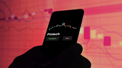 Fintech etf fondo en pantalla. Un teléfono muestra los precios del ETF para invertir. Texto en...