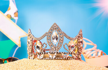 Desert Sand Ocean wind Diamond Crown put into Deep blue sky nature hot tropical island for Miss Beauty Pageant Contest Competition, bikini sash high heel shoes hang on outing trip camping background © Jade