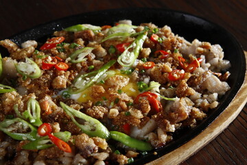 Sizzling sisig, a local Filipino dish and pick up food