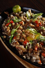 Sizzling sisig, a local Filipino dish and pick up food