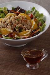 Quinoa, grilled chicken and mandarin orange salad with honey sesame vinaigrette