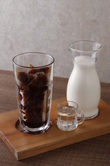 cold brew ice coffee cubes, warm milk and syrup