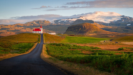 Ingjaldshólskirkja standing in the horizon somewhere on the Snaefellsnes peninsula, Vesturland,...