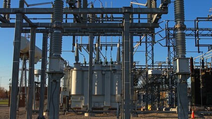 Electrical substation or electric grid of high voltage power lines and wires. Energy transmission...