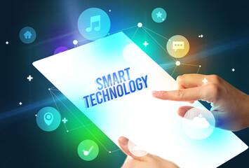 Holding futuristic tablet, new media concept