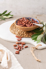 Dry raw butter beans in a bowl on a kitchen countertop. Cooking Healthy Food