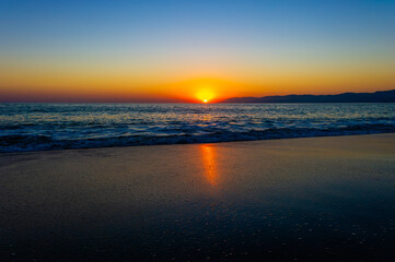 Fototapeta na wymiar Ocean Sunset Beach Nature Landscape Tropical Scenic Vivid Colors