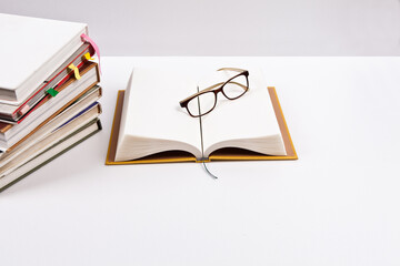 Books and glasses isolated from the background. You can change the background at will.