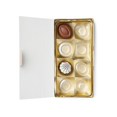 Partially empty box of chocolate candies isolated on white, top view