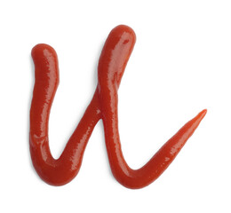 Letter U drawn by ketchup on white background