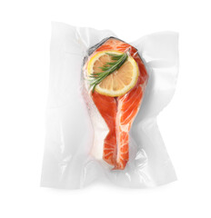 Salmon with lemon in vacuum pack on white background, top view